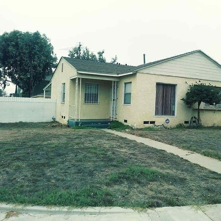 House Image with worn pain